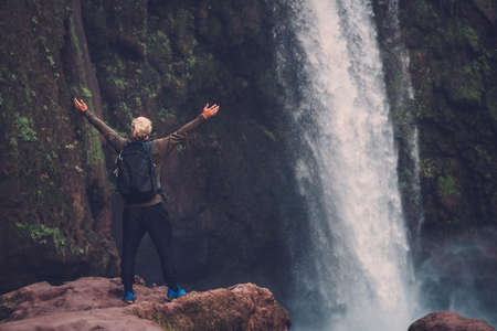 Cheerful adventurer near Ouzoud waterfall in Morocco.の写真素材