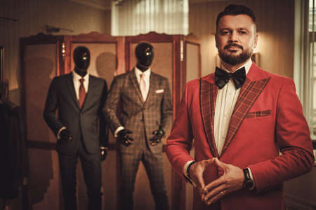 Extravagant stylish man in tailor studioの写真素材