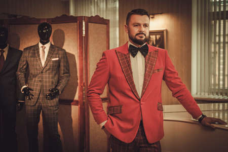Extravagant stylish man in tailor studioの写真素材