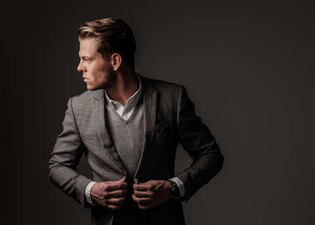 Confident sharp dressed man in grey jacketの写真素材