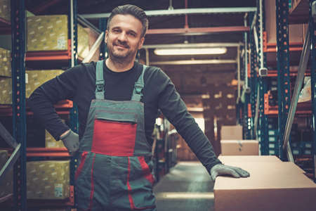 Storekeeper working in a warehouseの写真素材