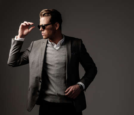 Confident sharp dressed man in grey jacket.の写真素材