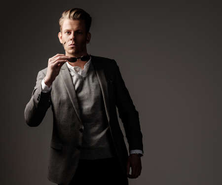 Confident sharp dressed man in grey jacket.の写真素材