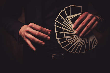 Man showing tricks with cardsの写真素材