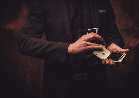 Man showing tricks with cardsの写真素材