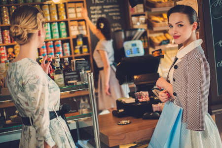 Young ladies shopping in a bakery