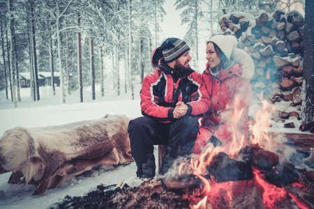 Couple in love near the fire