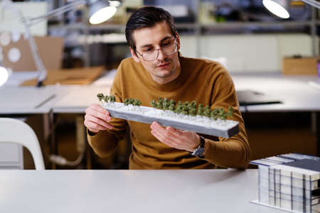 Man working in design and engineering architecture officeの写真素材
