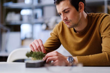 Man working in design and engineering architecture officeの写真素材