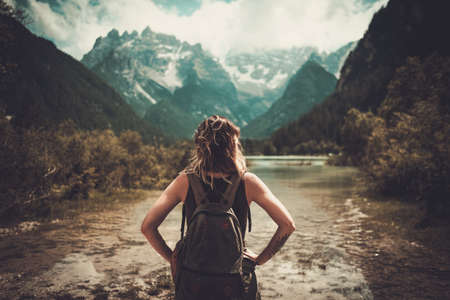 Woman enjoying amazing view of Lago di Braies.の写真素材