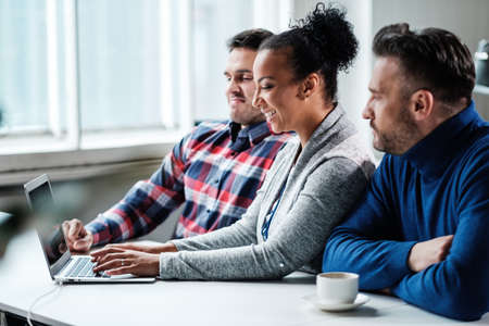 Multi-ethnic colleagues in a coworking office.の写真素材