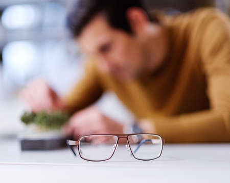 Man working in design and engineering architecture office.の写真素材