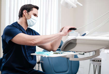Man dentist working in private practice.の写真素材