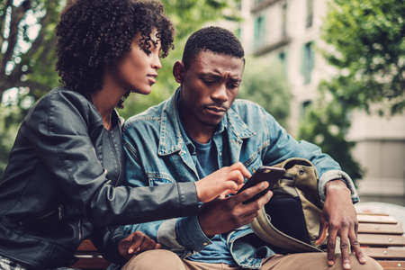 Young happy black couple outdoorsの写真素材