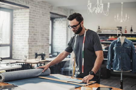 Fashion designer working in his studio