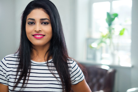 Young indian woman face close-up