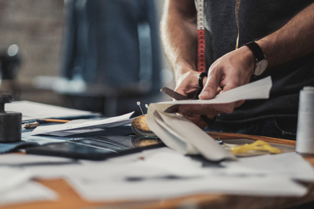 Fashion designer working in his studio