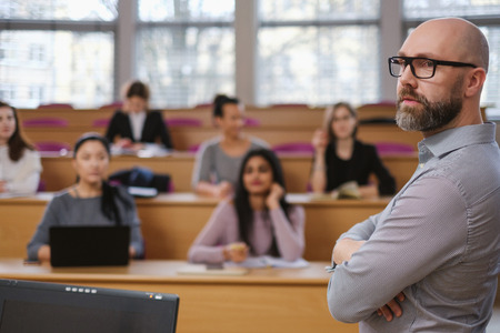 Multinational group of students in an auditoriumの写真素材