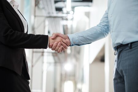 Business people shaking hands as a sign of agreementの写真素材