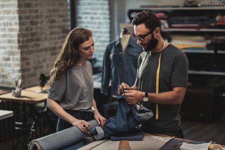 Fashion designer working in his studioの写真素材