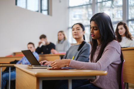 Multinational group of students in an auditorium