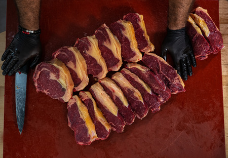 Slices of a fresh meat for a steakの写真素材