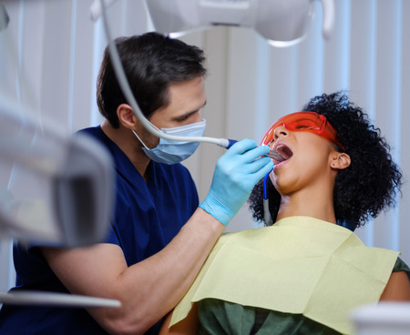 Woman patient at dentists private practice.の写真素材