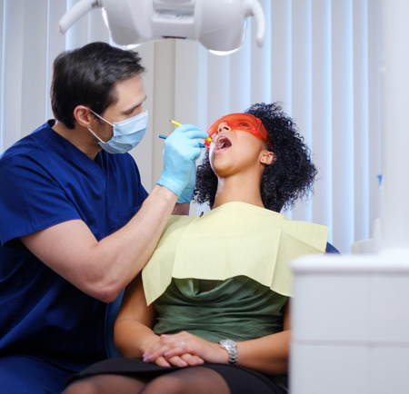 Woman patient at dentists private practice.の写真素材