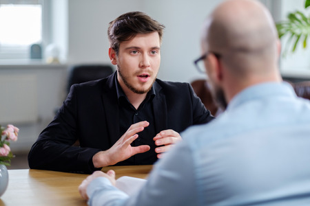 Confident young man attending job interviewの写真素材