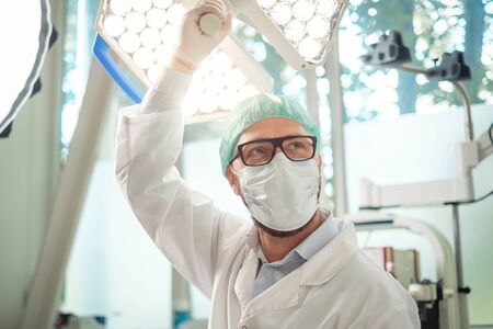 Male surgeon in an operation roomの写真素材