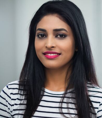 Young indian woman face close-up