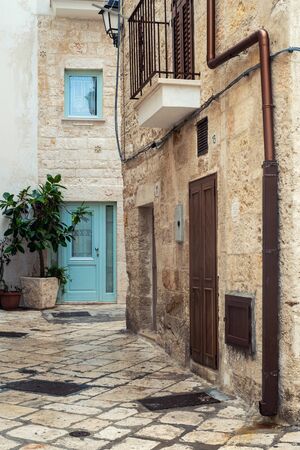 Charming narow streets of Polignano a Mare, Puglia, Italy.の写真素材