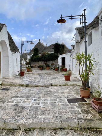 Walking streets of trulli town Alberobello, Italyの写真素材