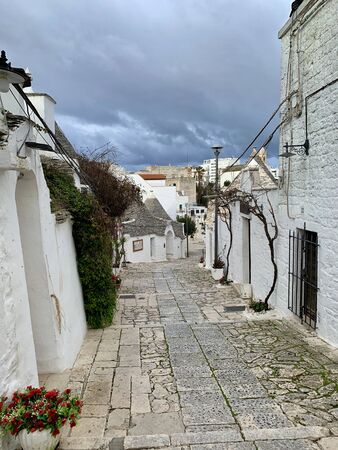 Walking streets of trulli town Alberobello, Italyの写真素材