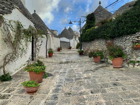 Walking streets of trulli town Alberobello, Italyの写真素材