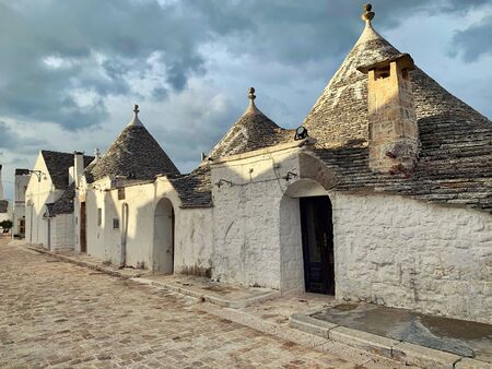 Walking streets of trulli town Alberobello, Italyの写真素材