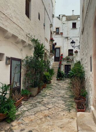 Walking streets of trulli town Alberobello, Italyの写真素材