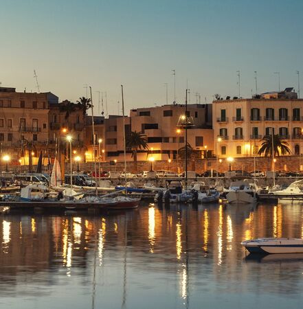 Old fishing boats in Bari, Italy.の写真素材