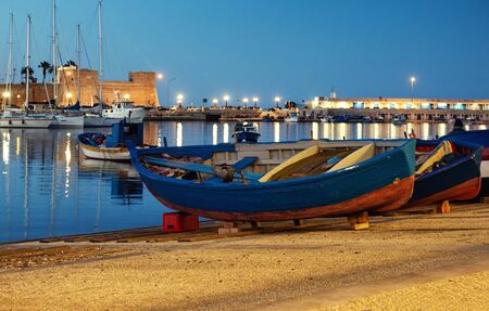 Old fishing boats in Bari, Italy.の写真素材