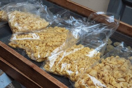 Fresh handmade typical Orecchiette pasta in Bari, Italy.の写真素材