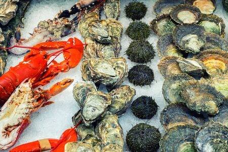 Various seafood at fish market in Bergen, Norway.の写真素材