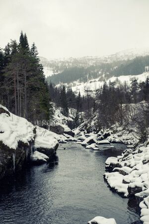 Beautifl winter mountain river in Norway.の写真素材