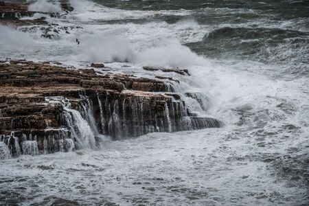 Stormy sea in Polignano a Mare, Italy.の写真素材