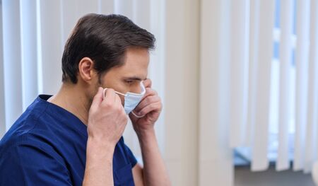 Doctor wearing protective mask in a hospital
