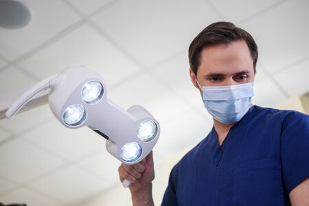 Doctor wearing protective mask in a hospital