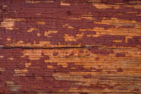Wooden boards with cracked paint