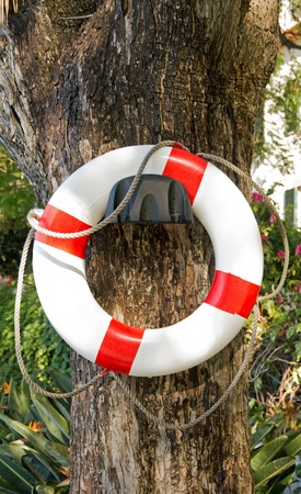 Life preserver collided on a wall, a foresight against the risk of drowning in swimming pool