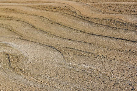 Zigzag on the ground at the end of harvest, tire tracks  Burgundy France 