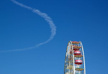 Cloud which plays with the big wheel, big wheel, cloud and blue sky