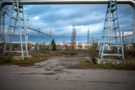 Columns of electrification of the railway line. Tracks in the background.の写真素材